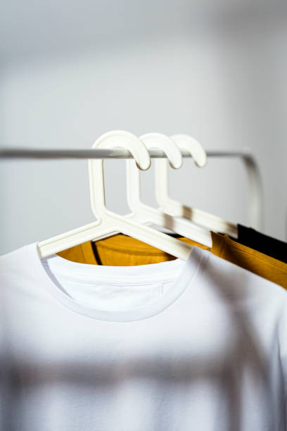 istock T-shirts displayed on clothes rack 1295688335