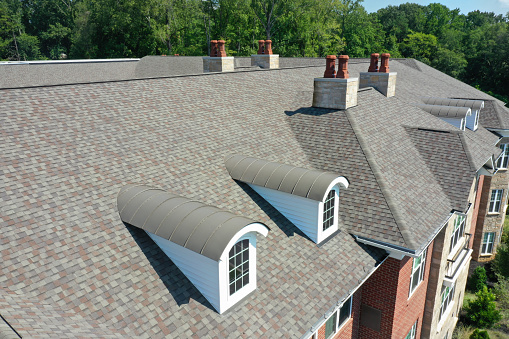 close up on gray roof shingle background