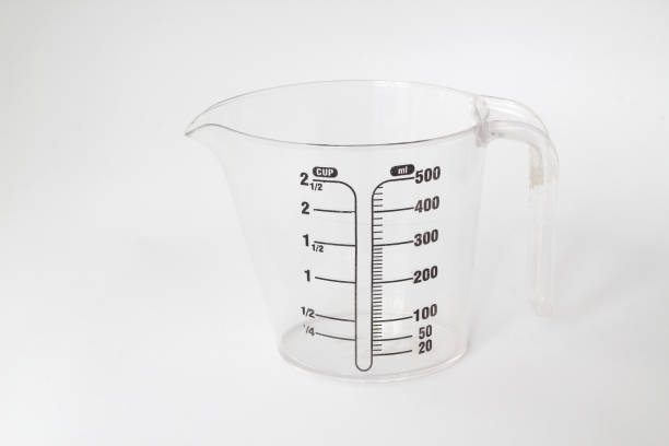 measuring cup isolated on white background. - measuring cup imagens e fotografias de stock