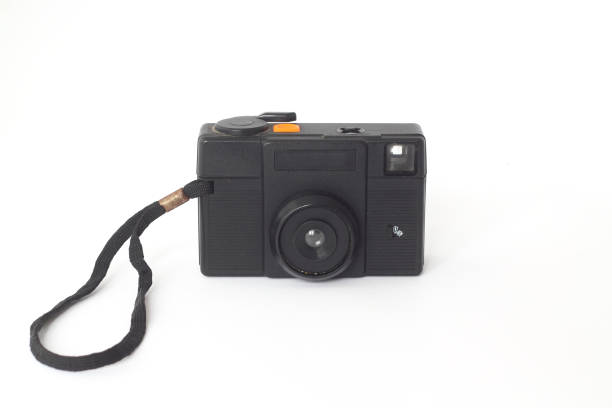 istock Vintage analog camera with isolated white background. old technology products for photography 1295692525
