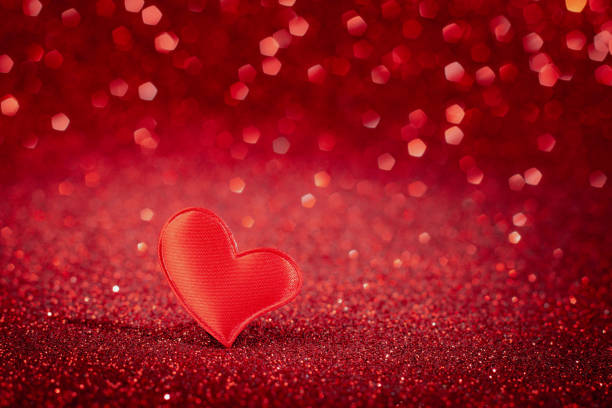 istock Cute red heart for valentine's day on bokeh background. Greeting card 1295700992