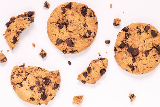 istock dark chocolate chip cookies piece stack and crumbs 1295702008