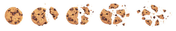 dark chocolate chip cookies piece stack and crumbs Isolated clipping path of die cut dark chocolate chip cookies piece stack and crumbs on white background of closeup tasty bakery organic homemade American biscuit sweet dessert chocolate chip cookie top view stock pictures, royalty-free photos & images