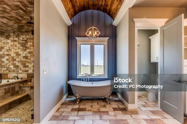 Bathroom Separation Between Shower Tub And Toilet Area Stock Photo - Download Image Now
