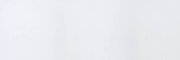 istock White concrete stone surface paint wall background, Grunge cement paint texture backdrop, White rough concrete stone wall background, Copy space for interior design background, banner, wallpaper 1295722314