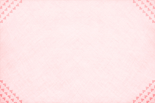 Light pale pink colored grungy background with hearts forming the border at all the four corners. Can be used as Valentine's Day, Xmas wallpaper, backgrounds, greetings card, gift wrapping sheet, picture frame.