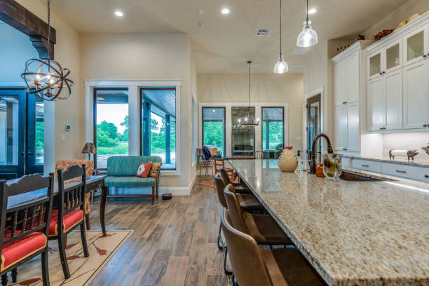istock Open concept kitchen and family room 1295724237