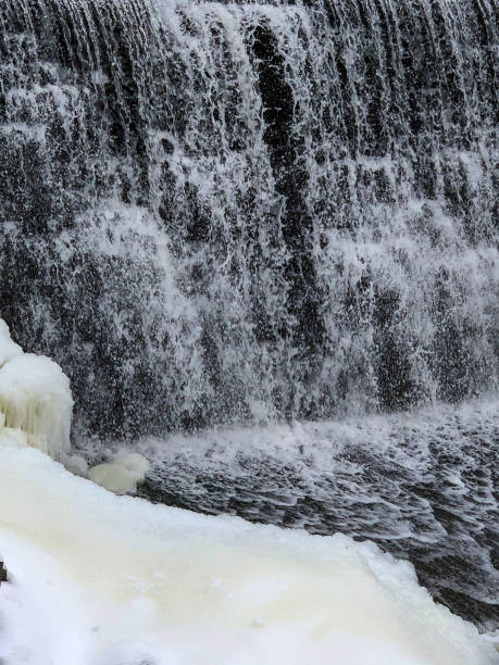 istock Snowy waterfall in Menomonee Falls, Wisconsin 1295728171