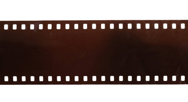 istock Dusty and grungy 35mm film texture material or surface 1295729172