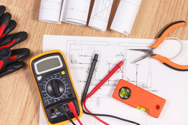 istock Electrical diagrams, multimeter for measurement in electrical installation and accessories for engineer jobs 1295729956