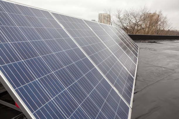 istock the solar panels on the roof on a raining day 1295730904