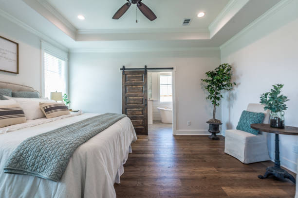 istock Gorgeous wood flooring in master bathroom 1295731728