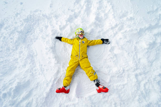 Ski holidays in mountains Ski holidays in mountains snow angels stock pictures, royalty-free photos & images