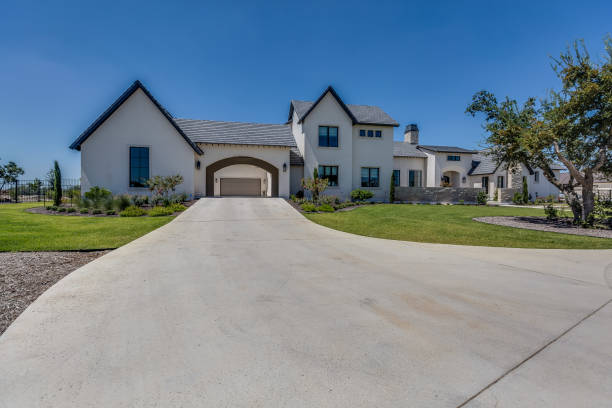 istock Long driveway leading through drive through covered parking area 1295735460