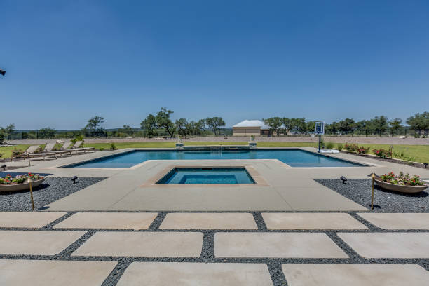 istock Gorgeous pool and landscaped yard 1295735473