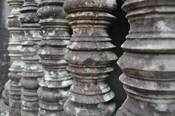 istock Angkor wat carvings and statues 1295738478