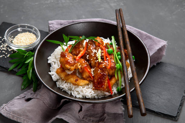 istock Chicken baked in sauce served with rice 1295744106