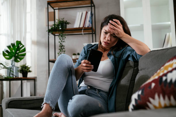 istock Upset woman waiting for a phone call. 1295748601
