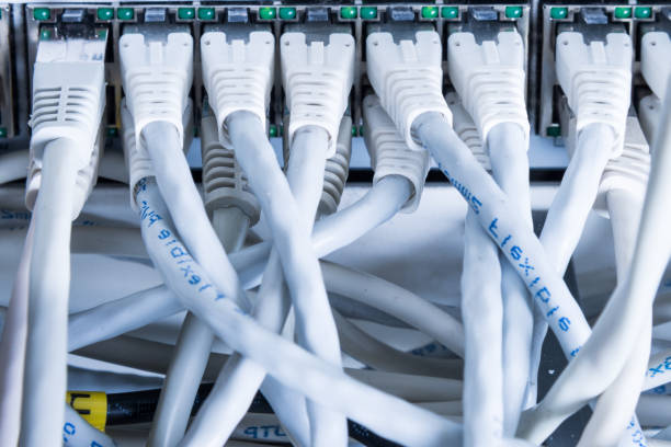 istock close-up of ethernet cables and switch 1295751138