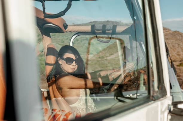 istock Woman driving a 4x4 off road 1295753847