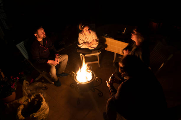 istock Night talk with camp fire and friends. 1295753945