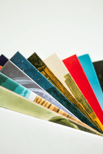 istock stack of books arranged in a fan shape, comics arranged in fan shape with copy space 1295754668