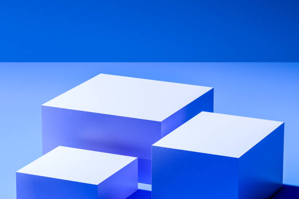 istock Showcase for advertising and product presentation. White blank cubes on blue background. 3d rendering 1295755094