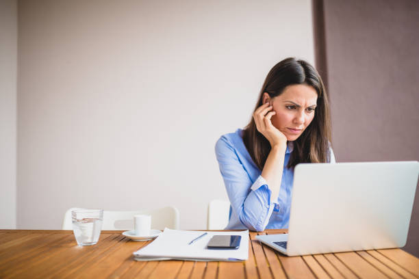 istock Young woman working on her balcony at home 1295757822