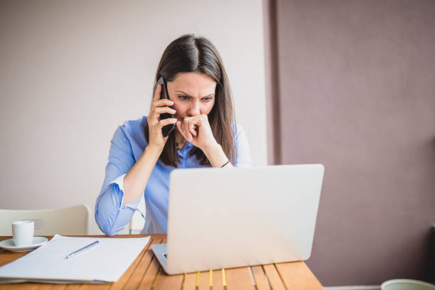 istock Young woman working on her balcony at home 1295757836
