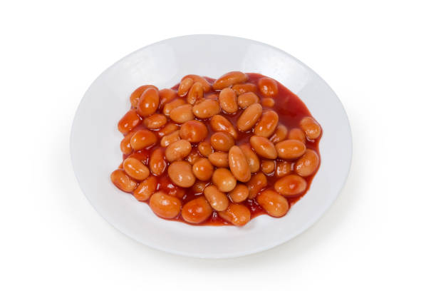 istock Beans stewed with tomato sauce on a white dish 1295759025