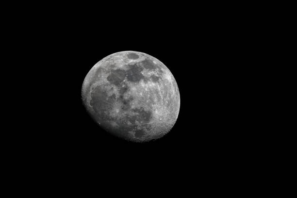 istock Gibbous moon, crescent, craters 1295759055