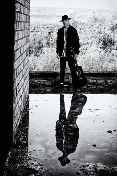 Made in some ruins of a building and taking advantage of the water on the ground I took this photo of the model taking his reflection