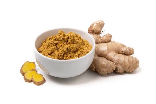 istock Fresh ginger root and ground ginger spice isolated on white background 1295762375