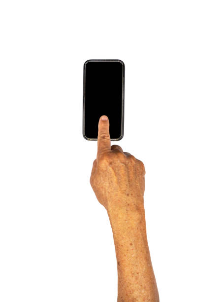 istock Senior hand clicking on empty black smart phone isolated on white background with clipping path 1295764686