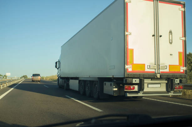 istock Driving behind  refrigerator truck or chiller lorry 1295766031