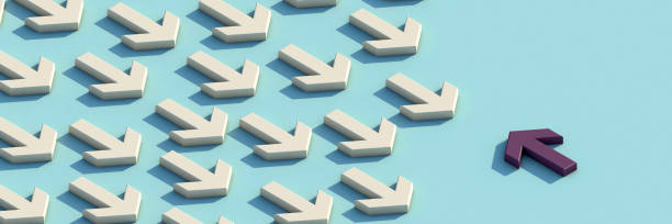 istock Purple arrow facing the opposite direction white arrows. 1295767422