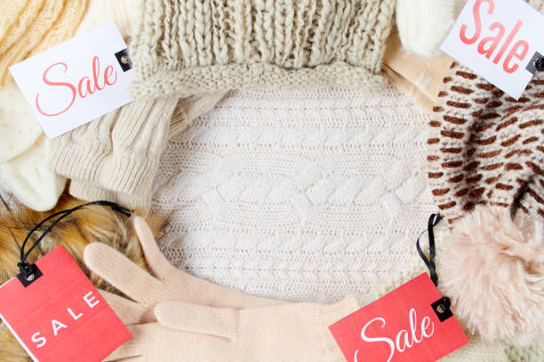 istock winter flat lay with mittens, hats and winter clothes 1295768358