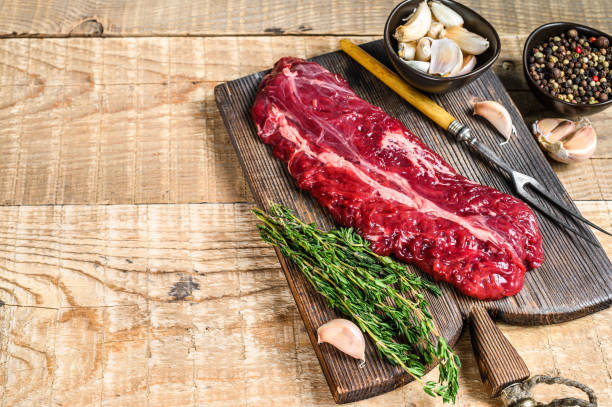 Butchers choice steak Onglet  Hanging Tender beef meat. wooden background. Top view. Copy space