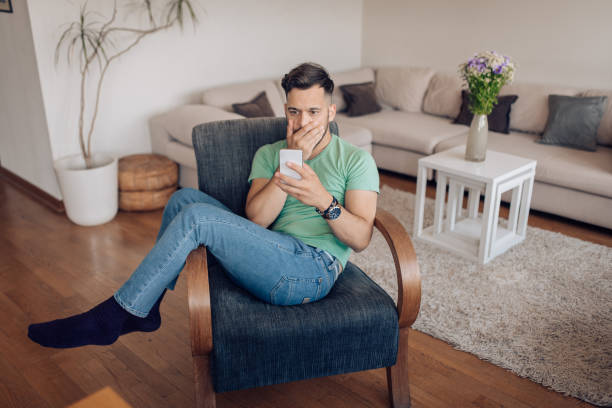 istock Young man read something on the internet and got worried 1295768773