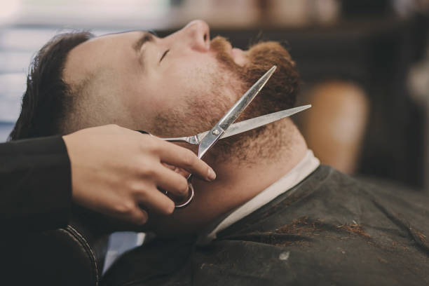 istock Male client in barbershop 1295772172