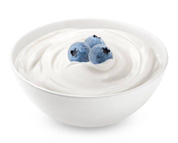 istock blueberry with sour cream, yogurt, isolated on white background, clipping path, full depth of field 1295773306