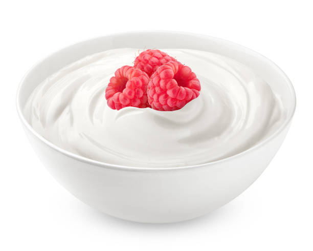 istock raspberry with sour cream, yogurt, isolated on white background, clipping path, full depth of field 1295773314