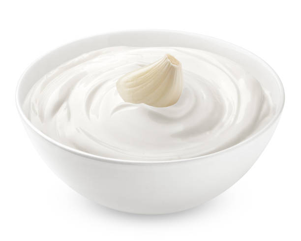 istock garlic with mayonnaise, sour cream, yogurt, isolated on white background, clipping path, full depth of field 1295773357