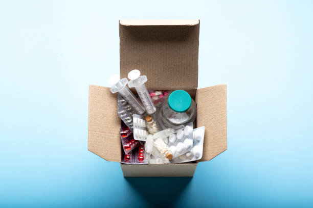 istock Delivery box filled with medicines and drugs. 1295773854