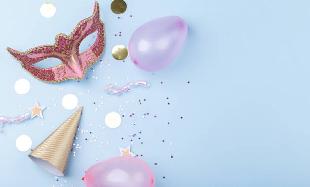 istock Carnival mask and confetti 1295777143