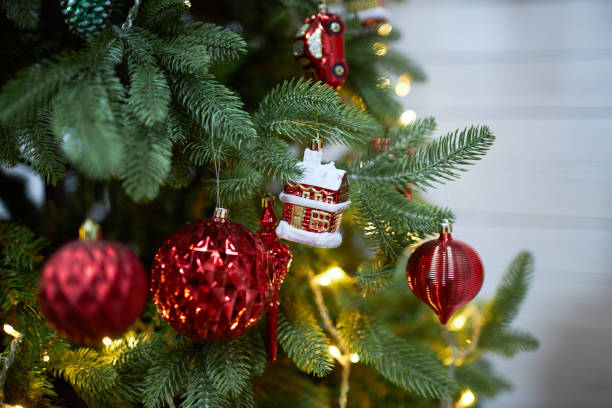 istock Christmas tree decorated with sparkling balls and cones 1295779362