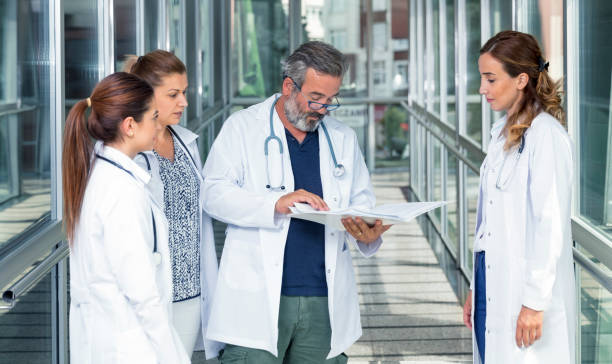 istock Giving the doctor a progress report on a patient 1295779558