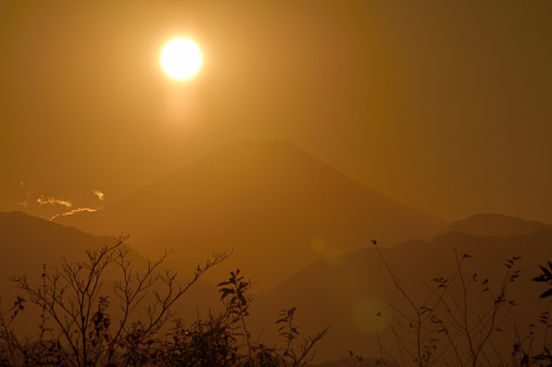 The sun is setting in on the peak of Mt. Fuji on December 21, 2020, the day of the winter solstice, which was taken from the summit of Mt. Takao, located in the suburbs of Tokyo.
Mt. Fuji is designated as UNESCO World Heritage site.