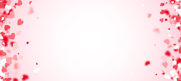 istock Valentines day card. Heart confetti falling over pink background for greeting cards, wedding invitation. 1295781705