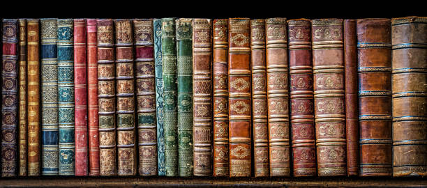 istock Old books on wooden shelf. Tiled Bookshelf background. 1295787664